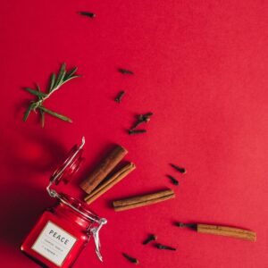 Scented Candle on a Red Glass Jar